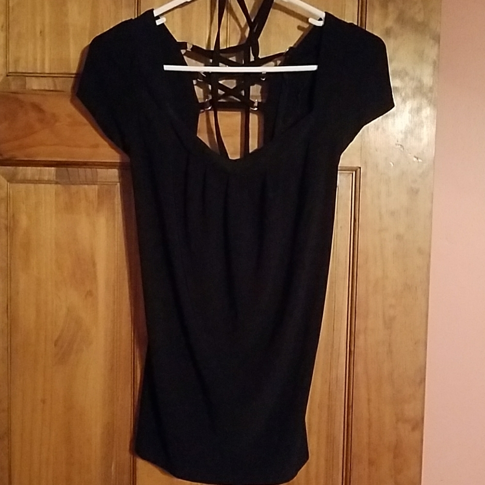 Black dress shirt, tie in the back